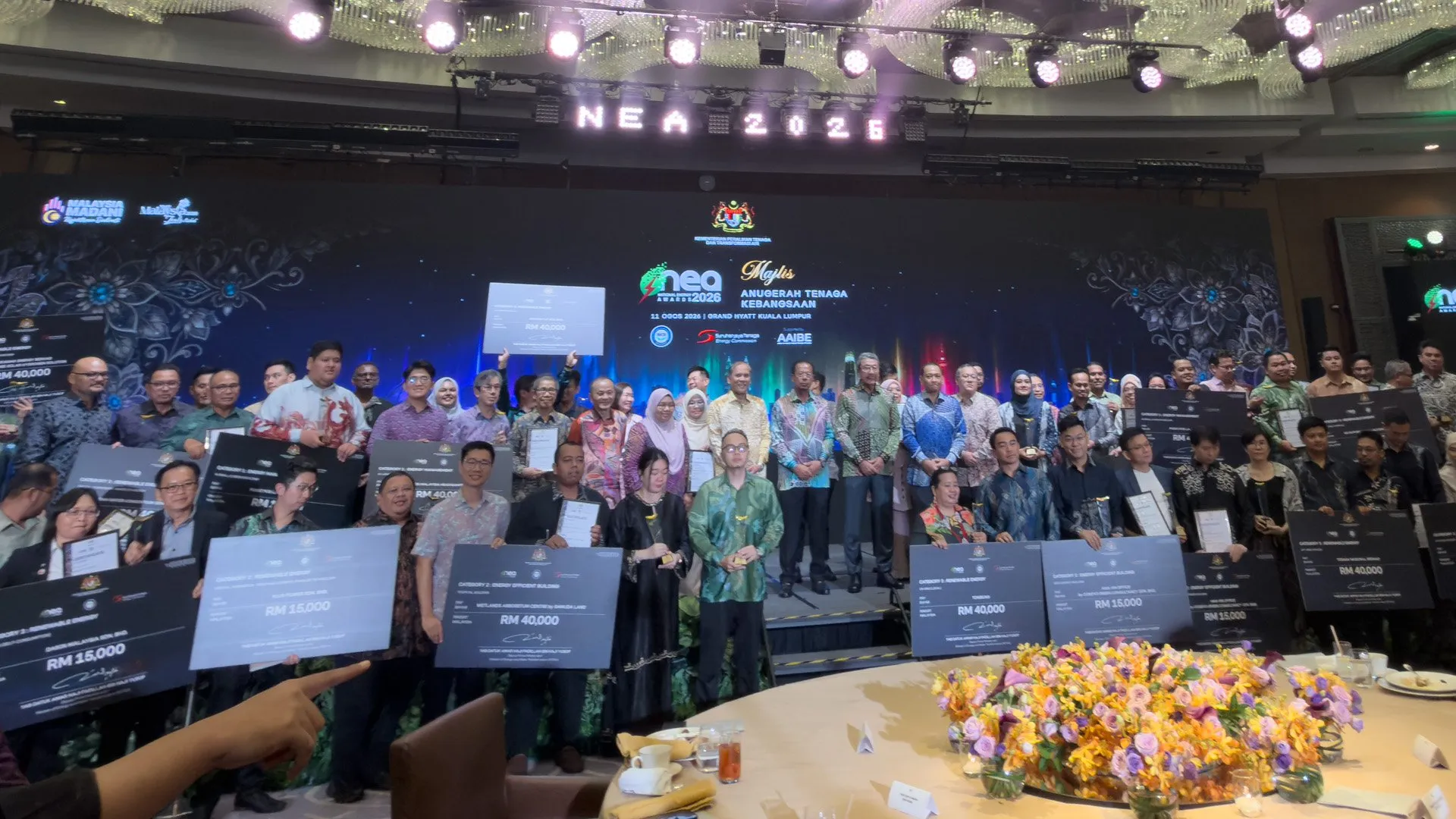 Group photo of all National Energy Awards 2026 category winners on stage at the Grand Hyatt Kuala Lumpur, where RPG Green Technology was recognised as Renewable Energy Runner-Up