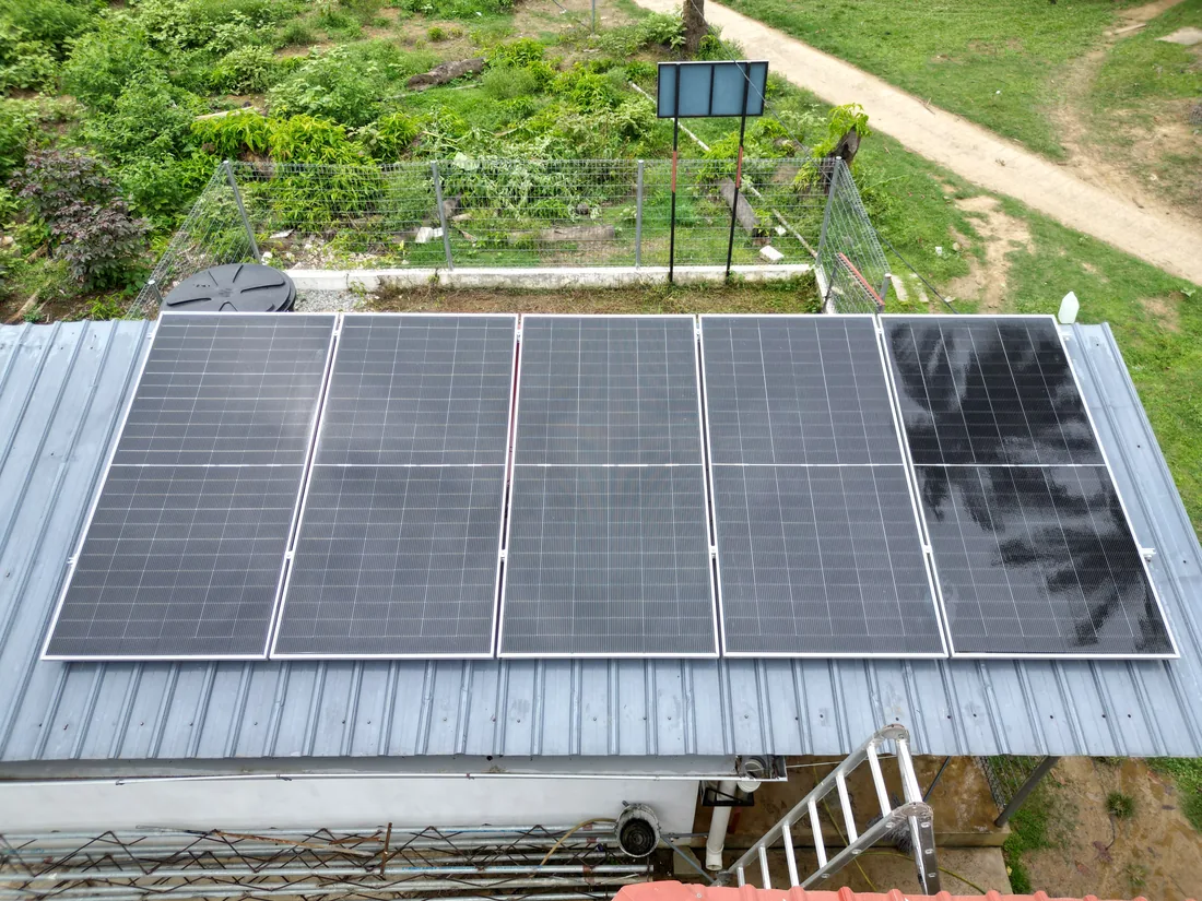 Aerial view of solar panels installed on the roof of the award-winning off-grid solar and clean water pump house in Kelantan
