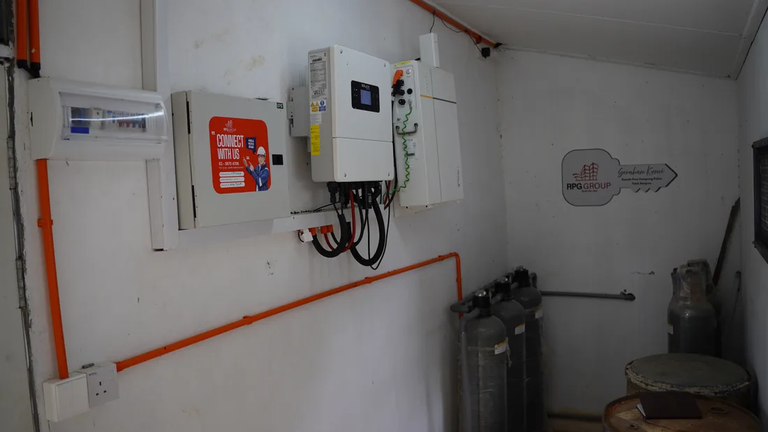 Close-up of the hybrid inverter and battery system installed for the award-winning Kelantan clean water project, with RPG Group branding